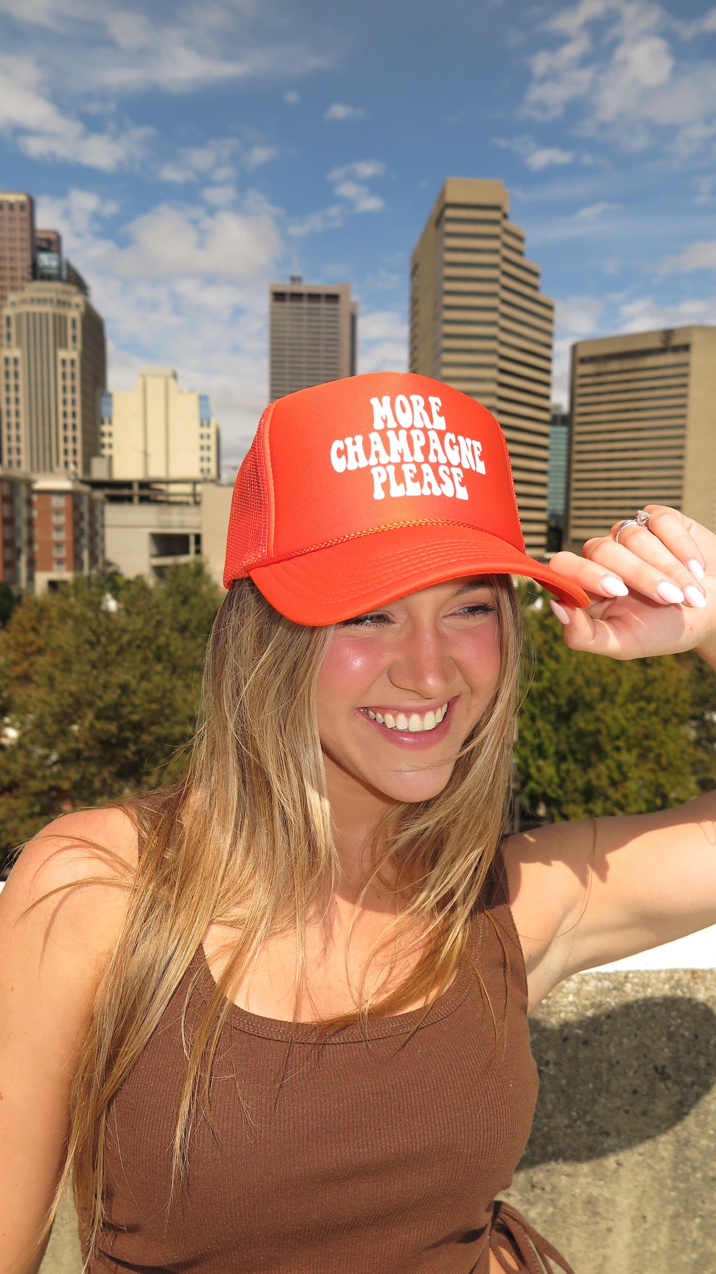 More Champagne Please Trucker Hat